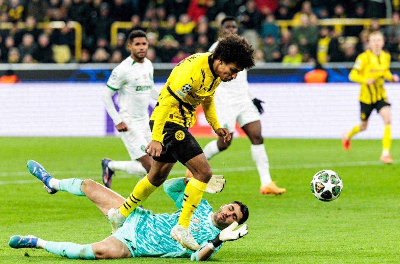 包含多特蒙德艰难获胜，再掀高潮的词条